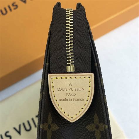 lv toiletry pouch as clutch